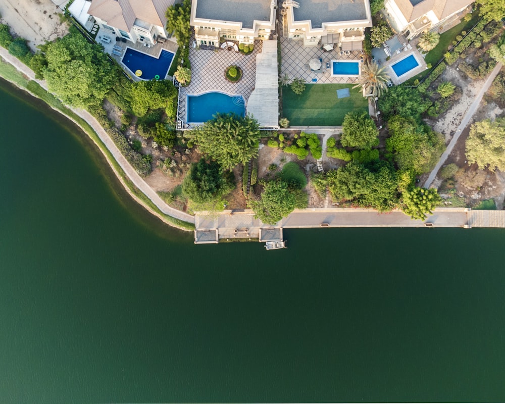 an aerial view of a house with a swimming pool