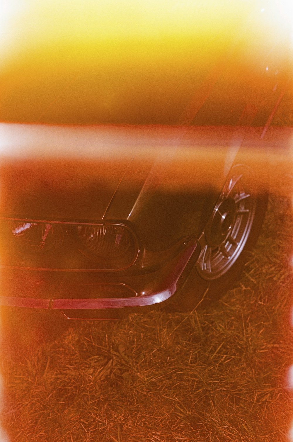 a car parked in a field of grass