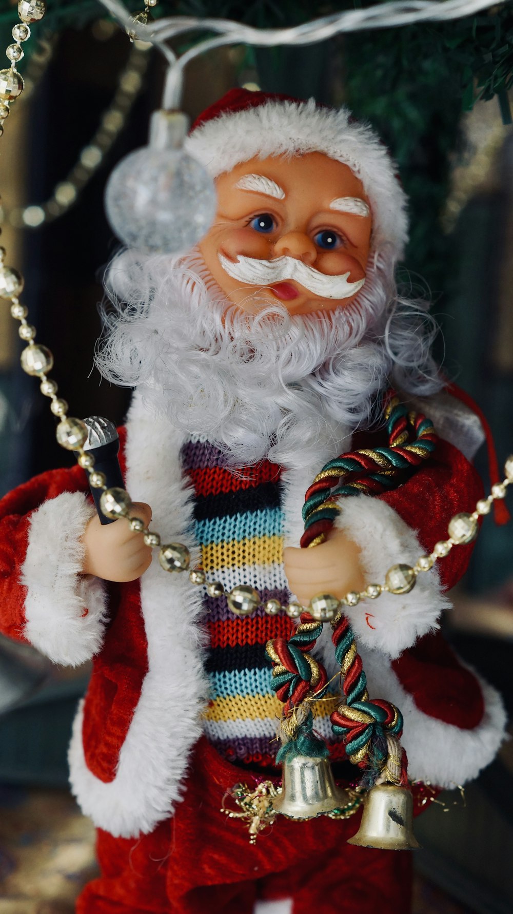 a close up of a santa clause ornament