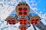 A close-up of a rocket engine igniting during launch.
