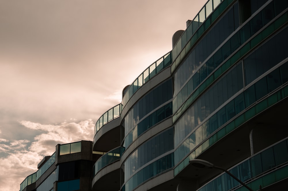 a tall building with a sky in the background