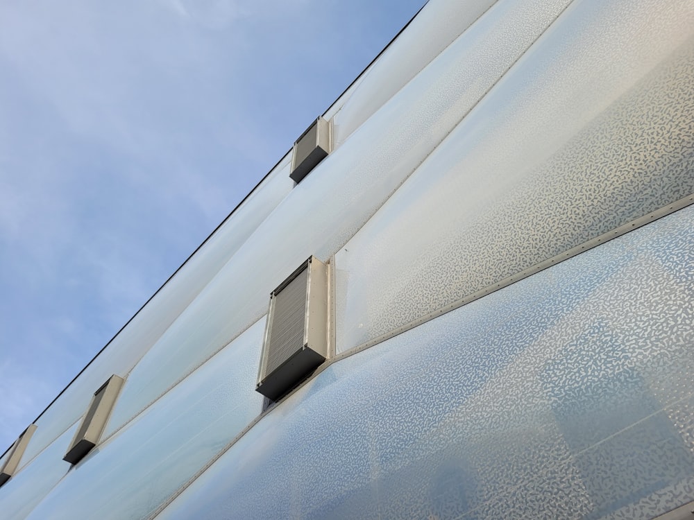 a close up of a building with a sky background