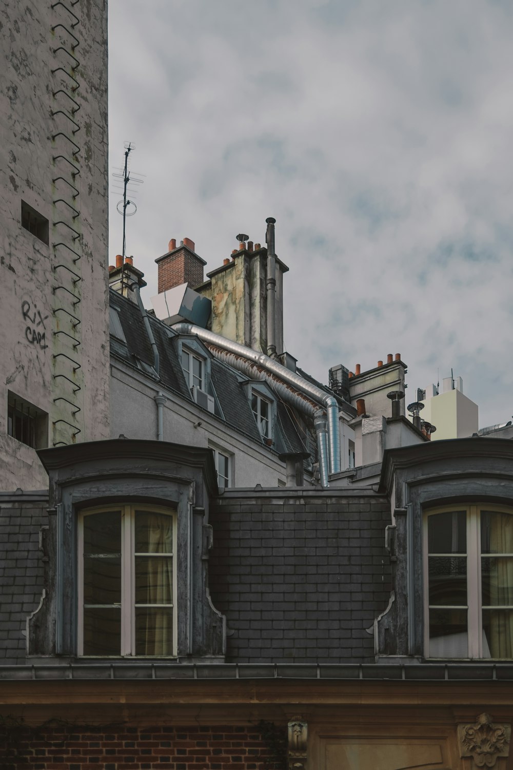 a view of a building with a sky background