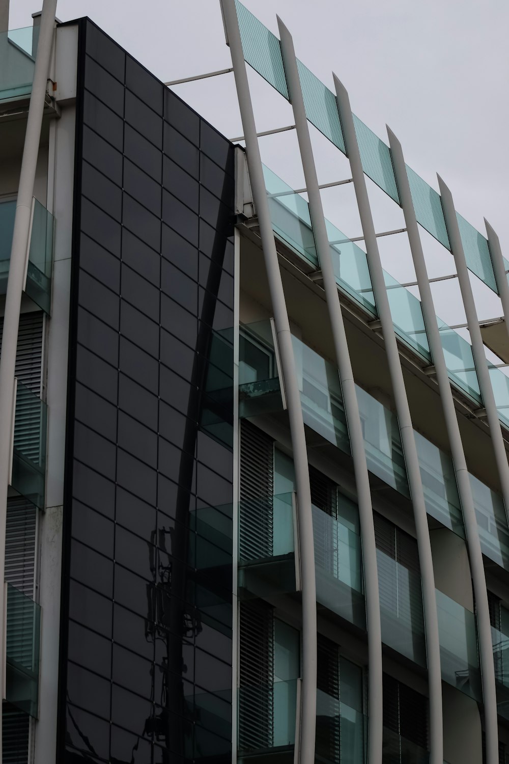 a tall building with a clock on the side of it