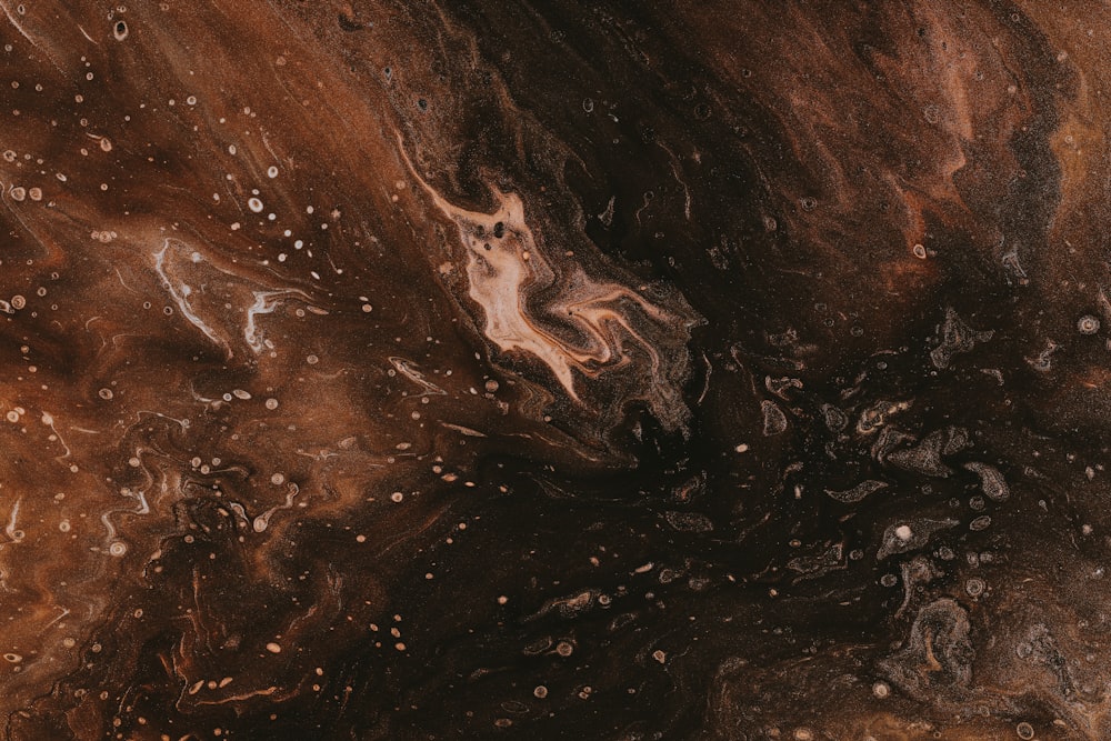 a close up of a brown and black substance