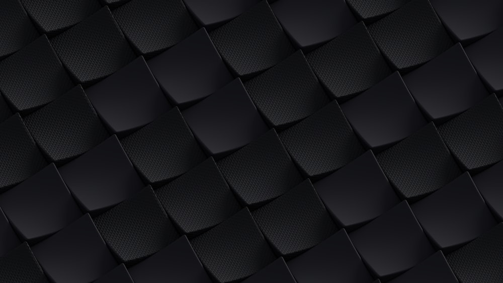 a black background with a pattern of squares