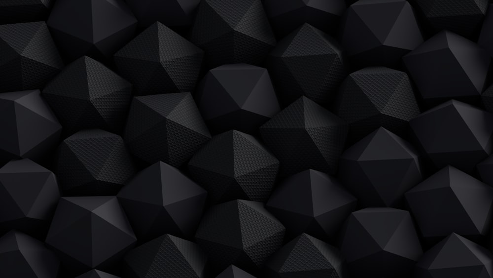 a black background with a lot of black cubes