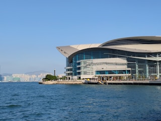 a large building sitting on top of a body of water