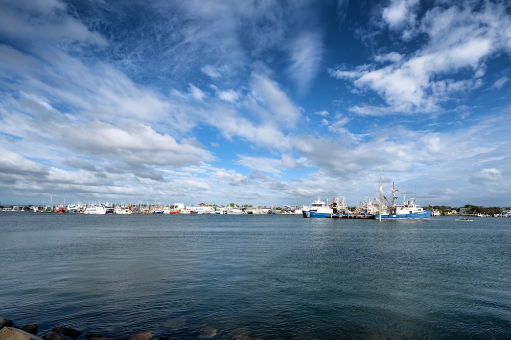 a body of water with a bunch of boats in it