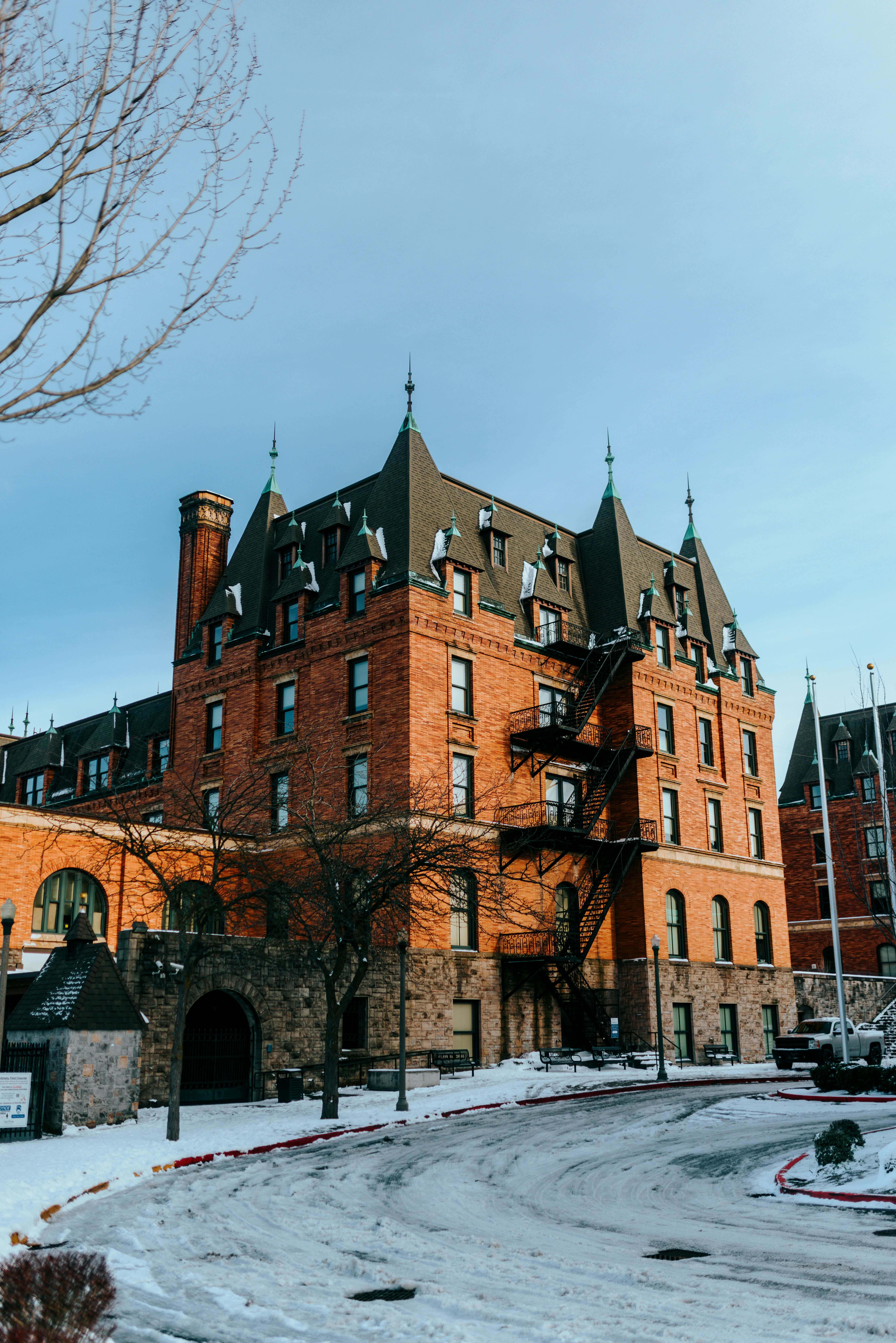a large brick building with a clock tower on top of it