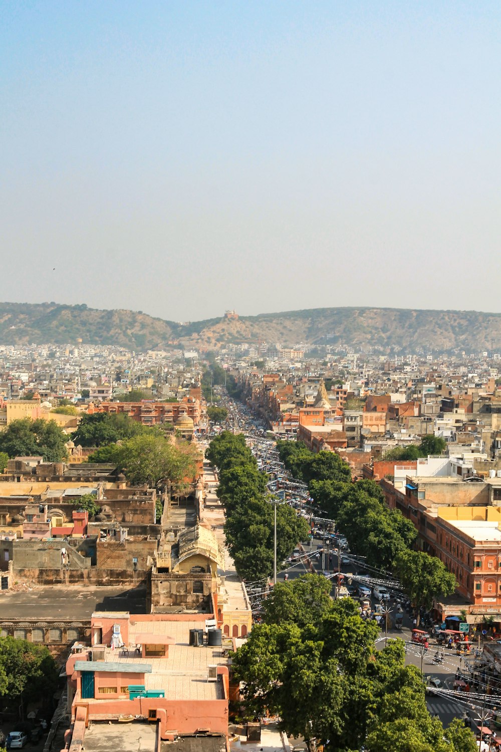 a view of a city from a hill