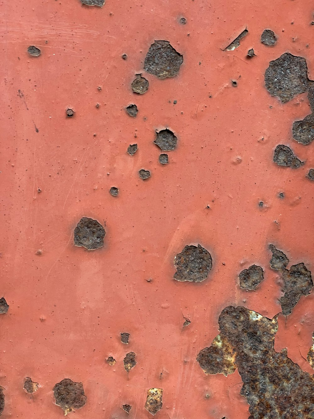 a close up of a rusted metal surface