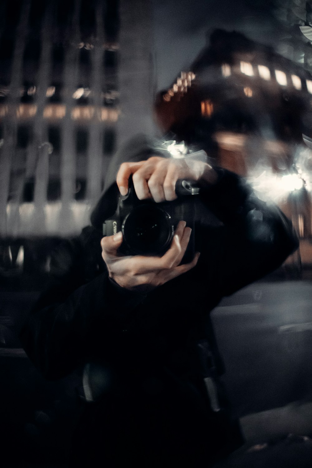 a man taking a picture of himself with a camera