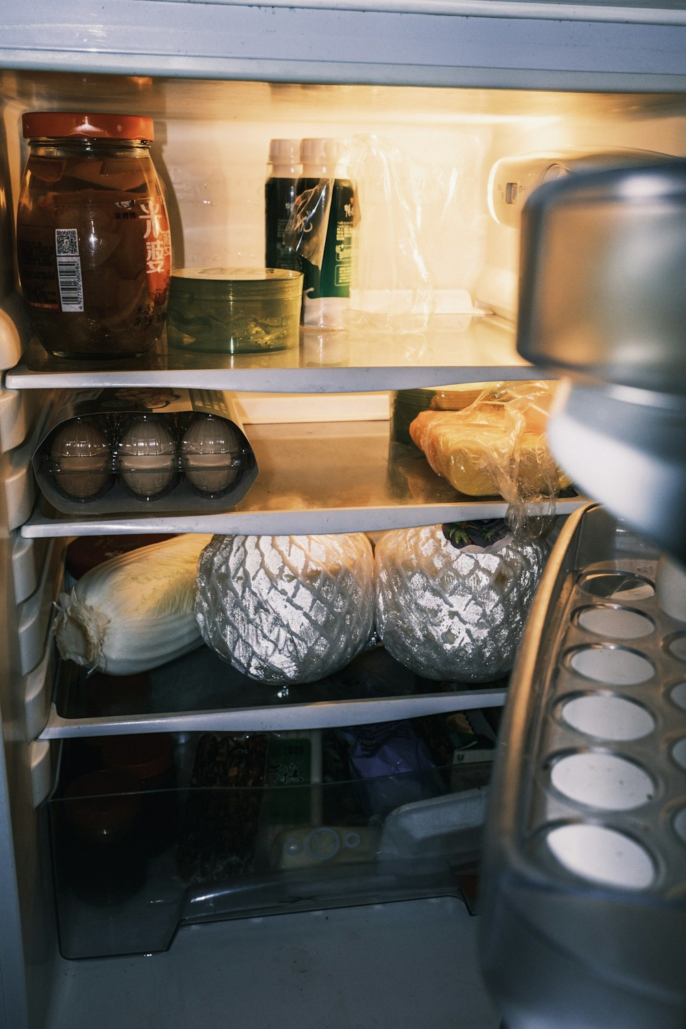 an open refrigerator filled with lots of food