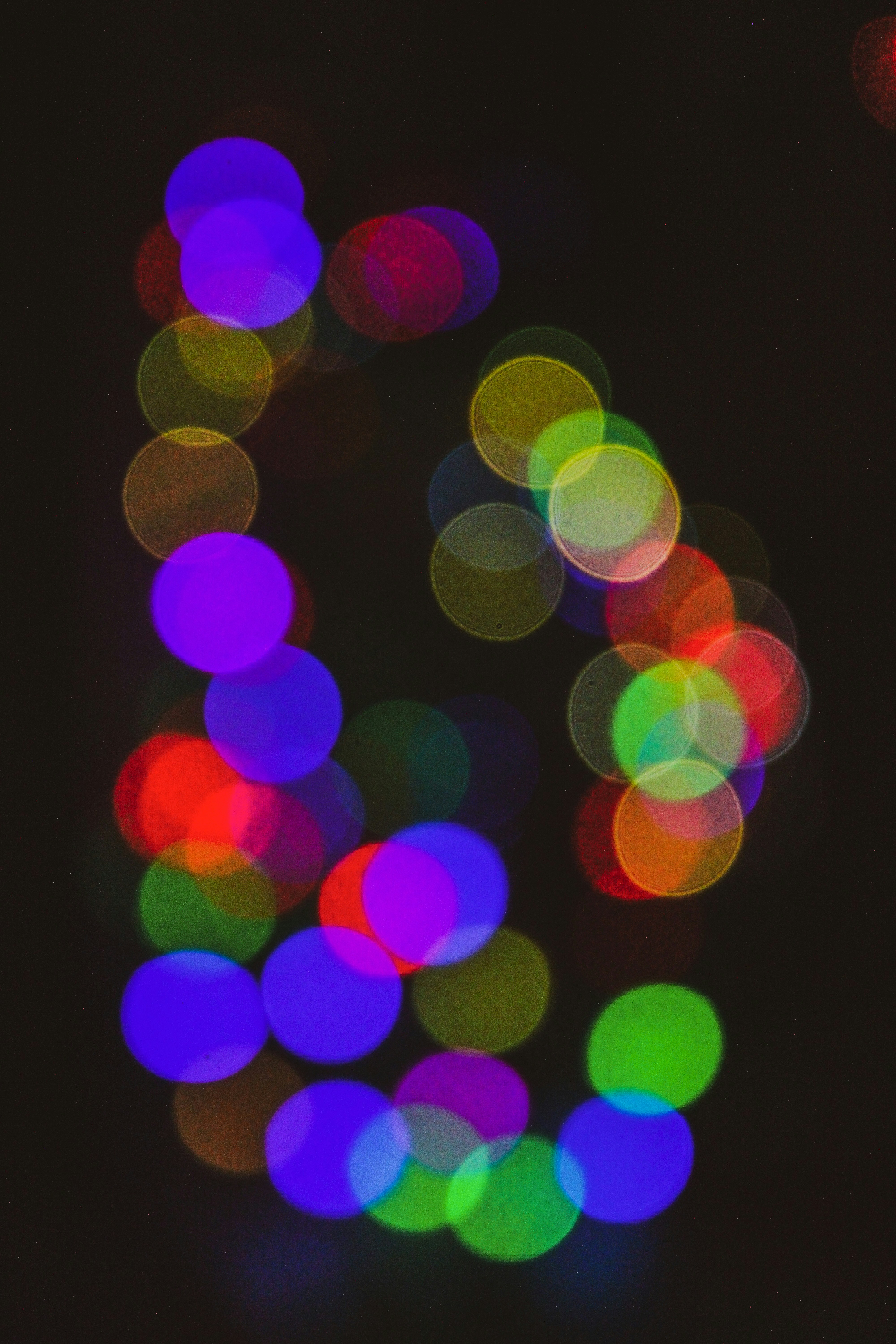 a blurry photo of colorful lights in the dark