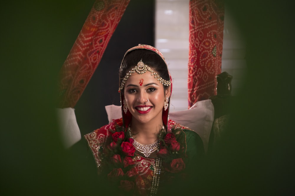 a woman in a red and green outfit