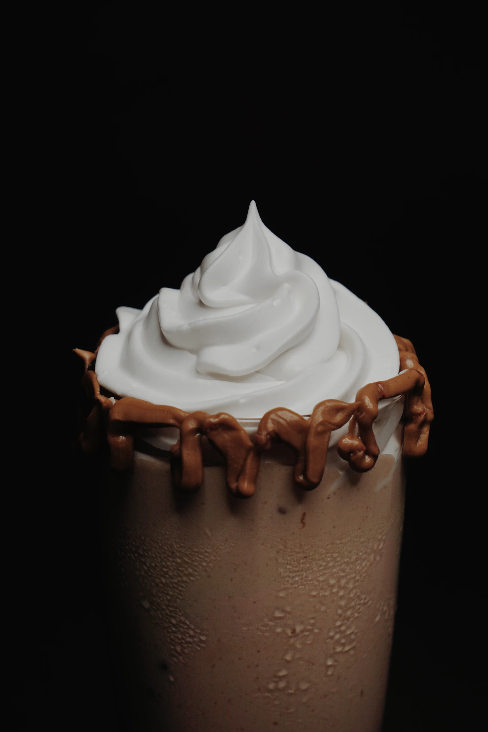a chocolate drink with whipped cream on top