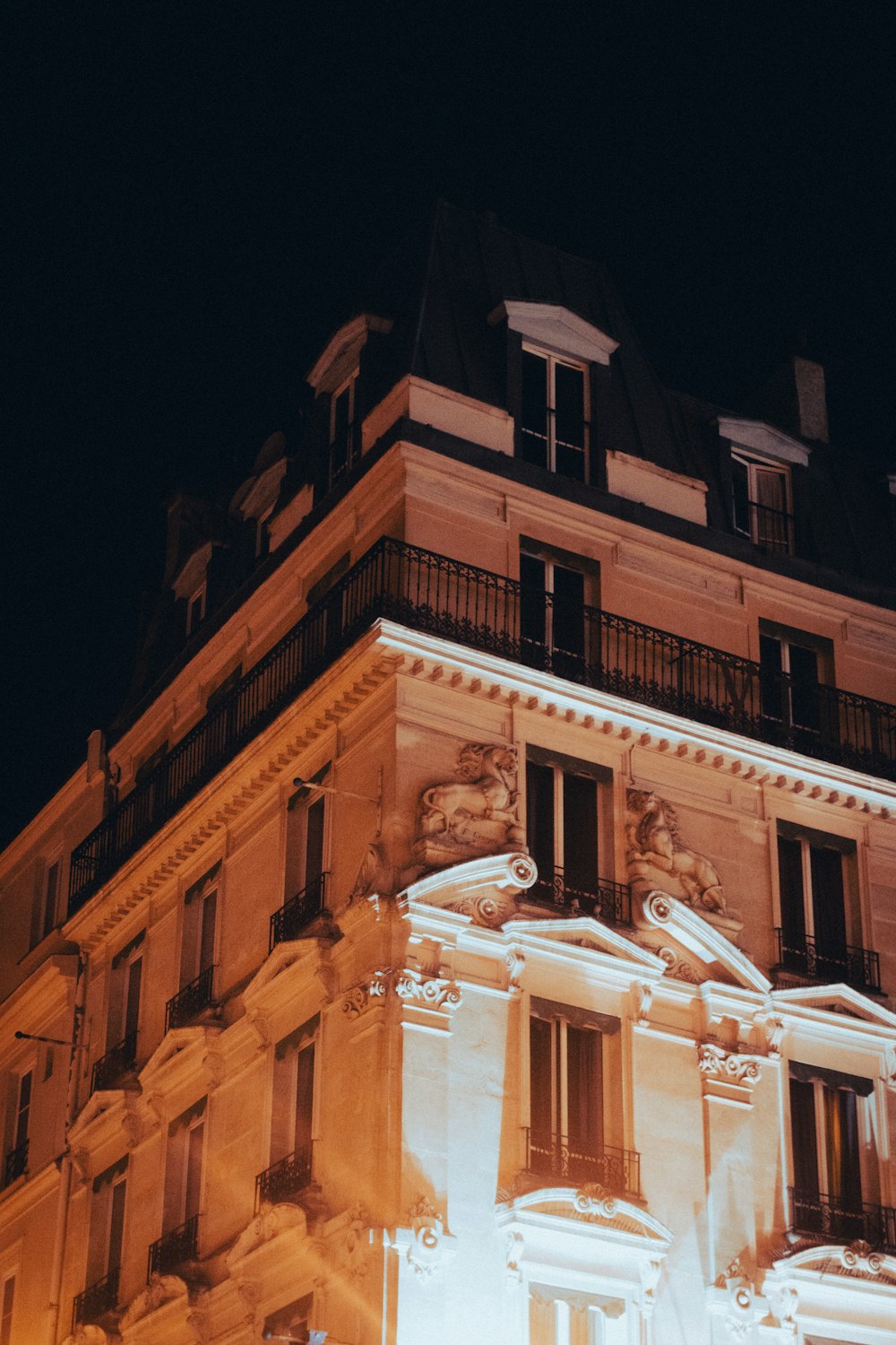 a tall building with a clock on the top of it