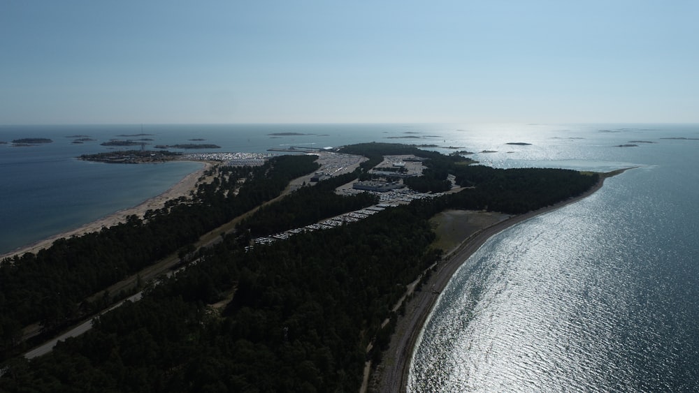 a bird's eye view of a beach and a body of water