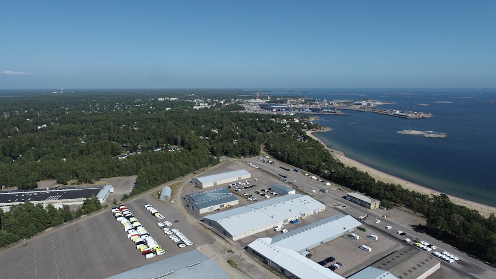 an aerial view of an industrial area near the water