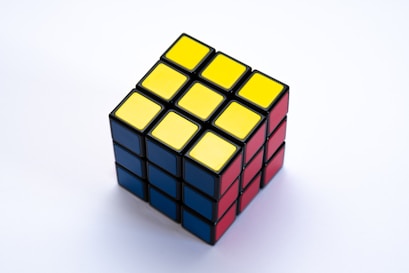 a rubik cube on a white background