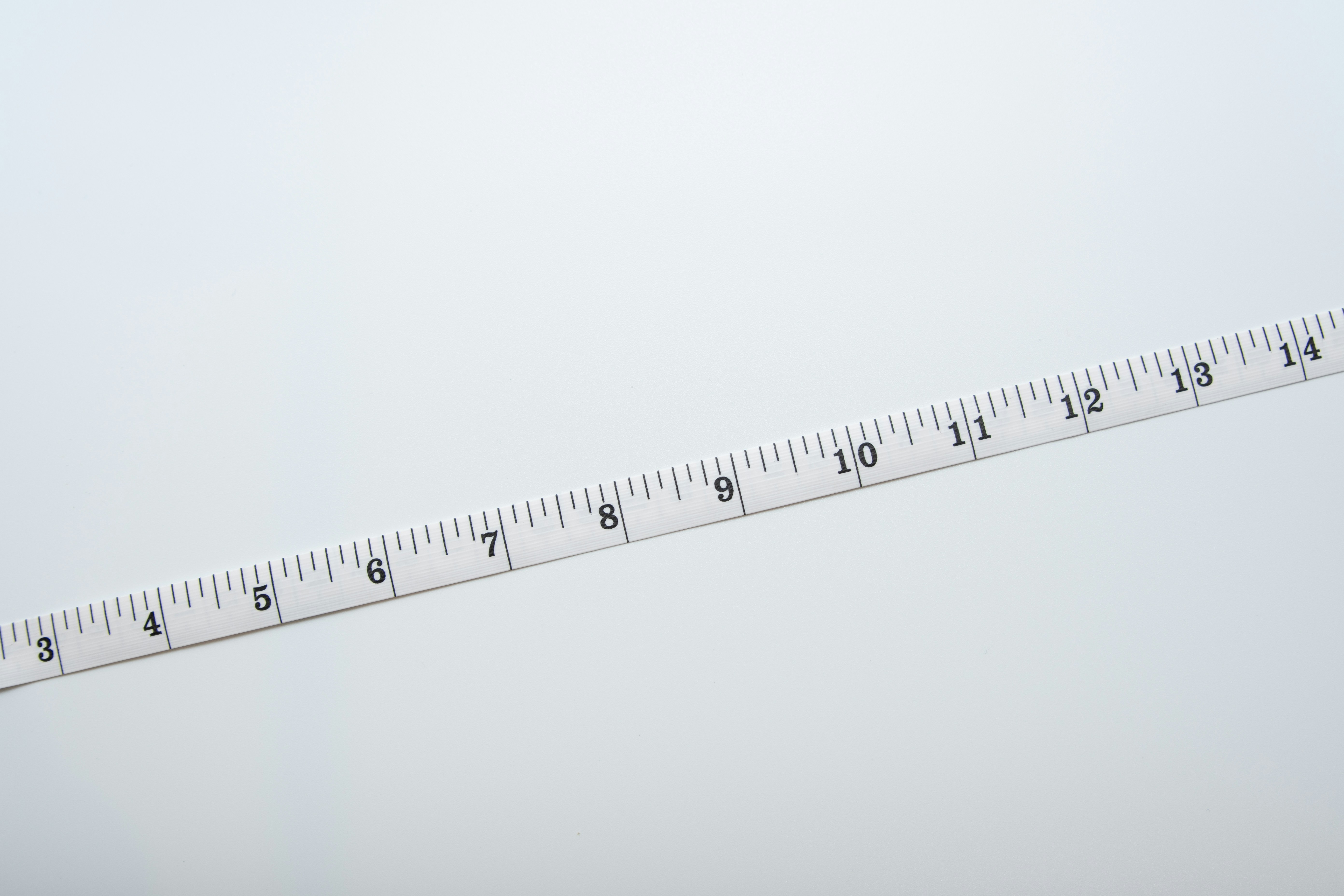 centimetre measurement tape on white background