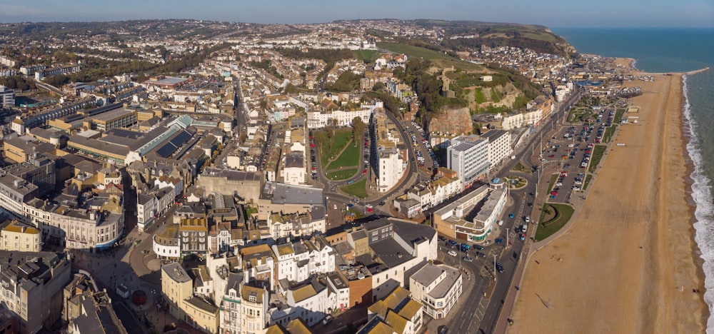 a bird's eye view of a beach and a city