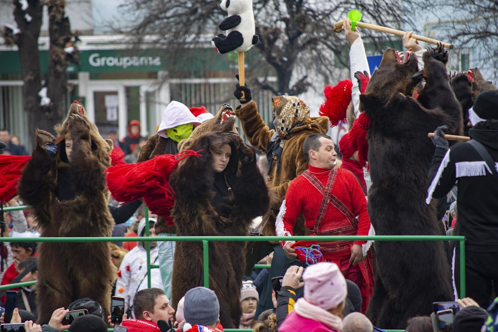 a group of people dressed in animal costumes