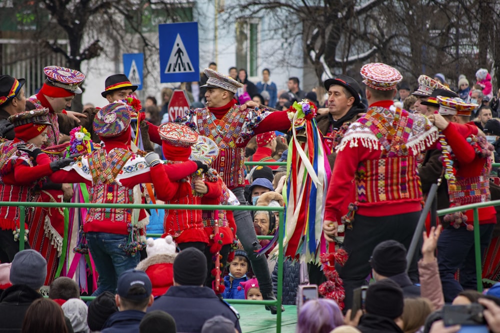 a large group of people in red outfits