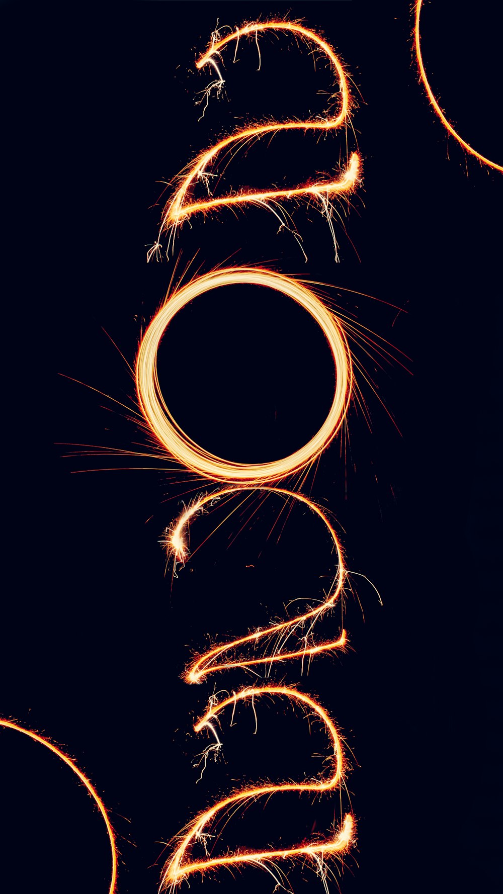 the word sparkle spelled out with fire sparklers