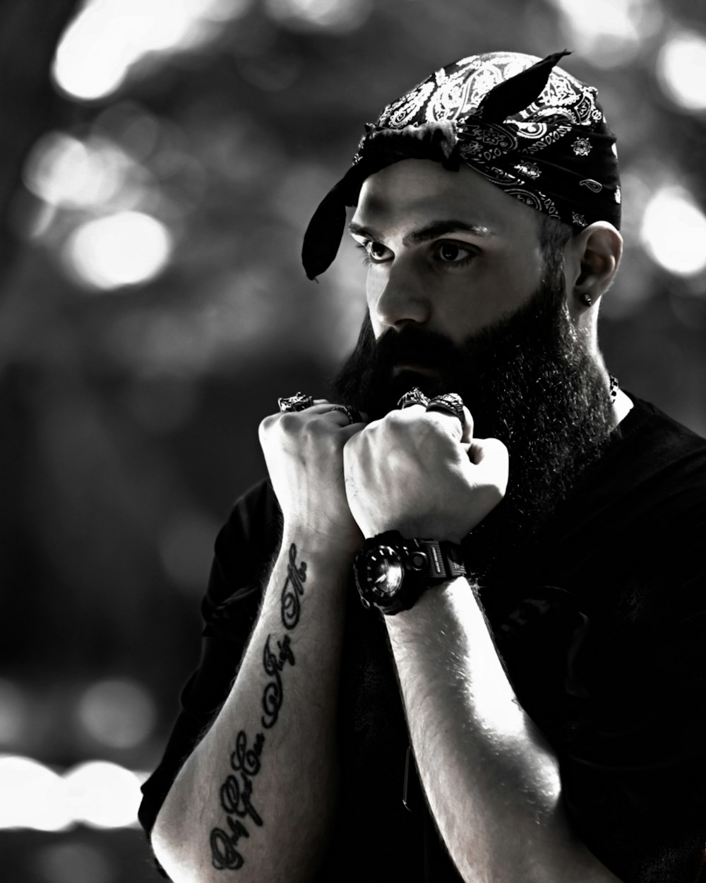 a man with a beard wearing a bandana