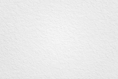 Soft white textures blending into a seamless background.