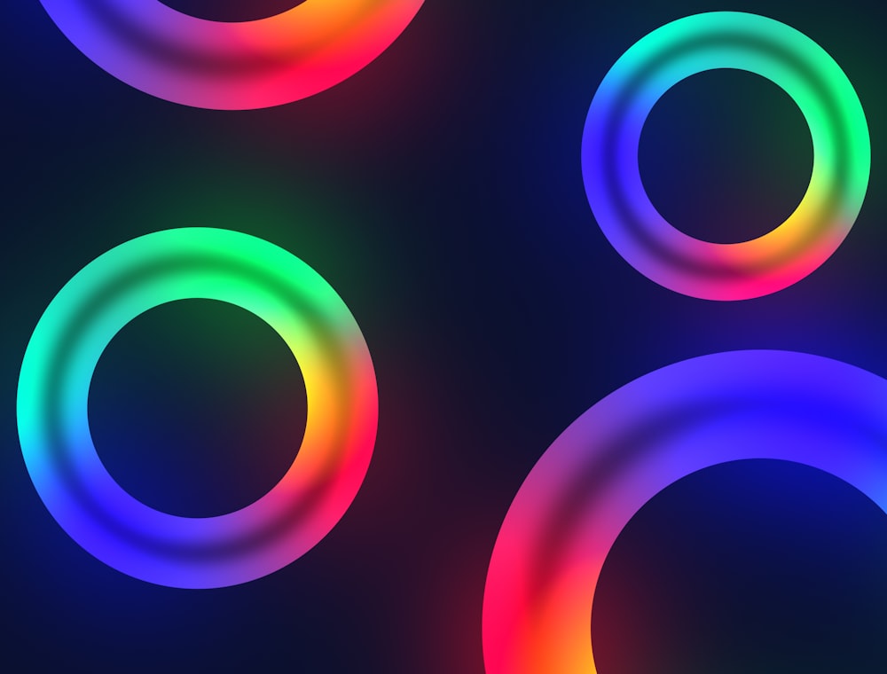 a group of colorful circles on a black background