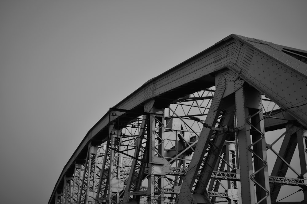 a black and white photo of a bridge