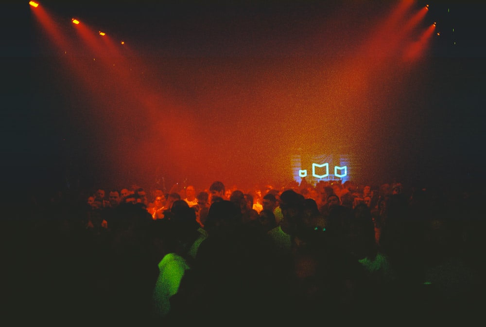 a group of people standing on top of a stage