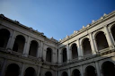an old building with arches and arches on it
