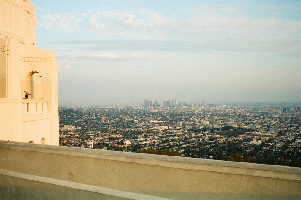 a view of a city from the top of a building