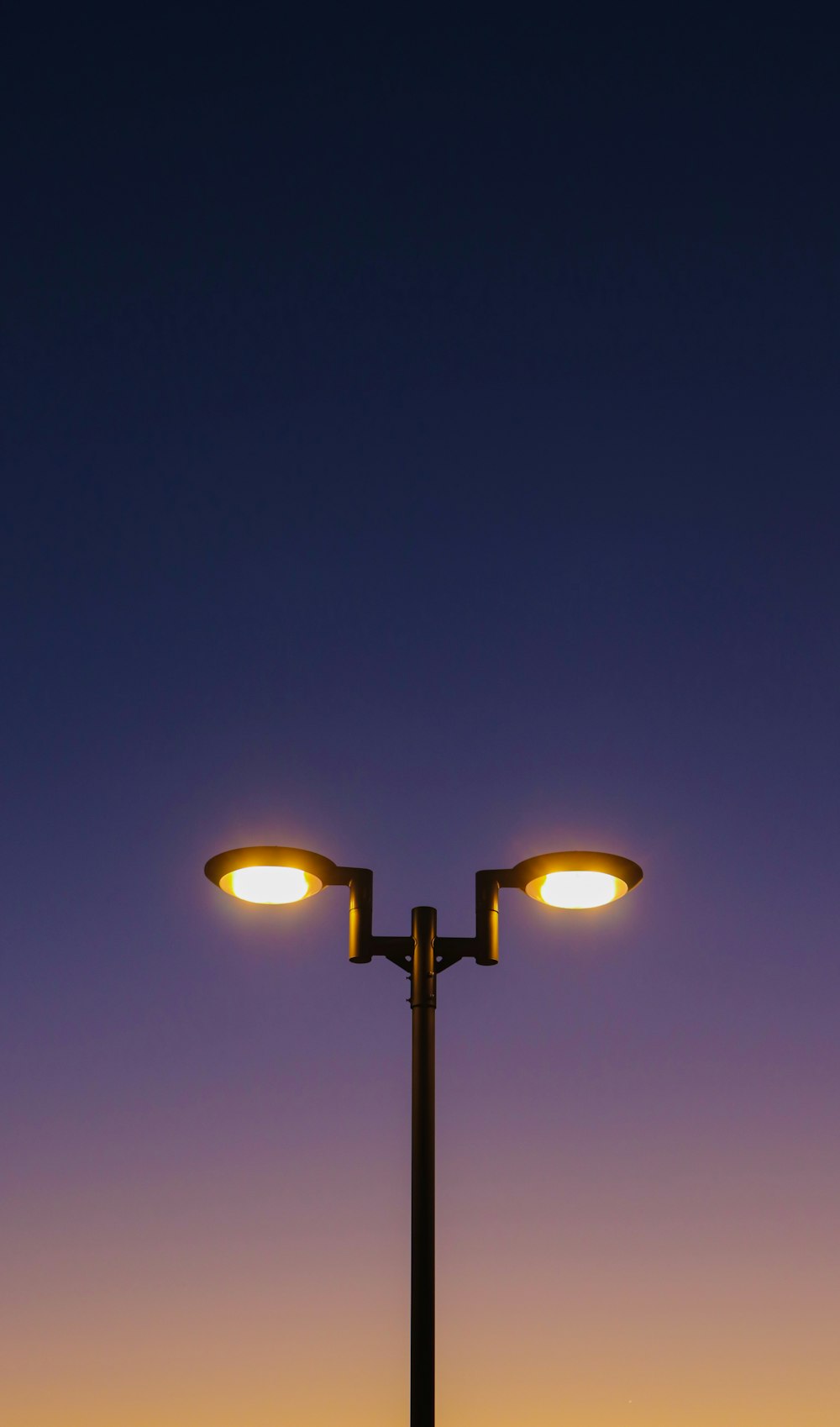 a couple of street lights sitting next to each other