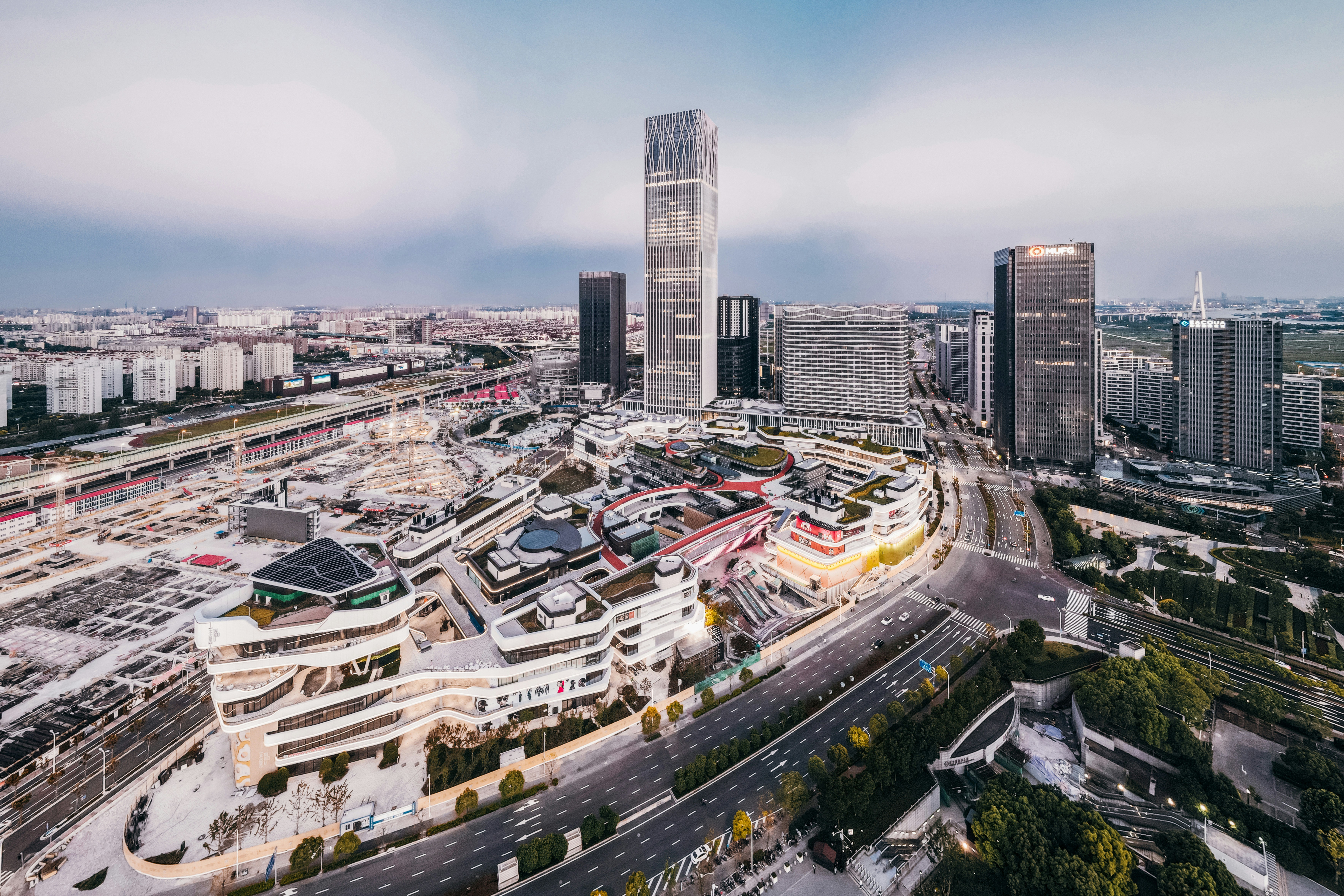 An aerial view of a city with tall buildings photo – Free Building ...