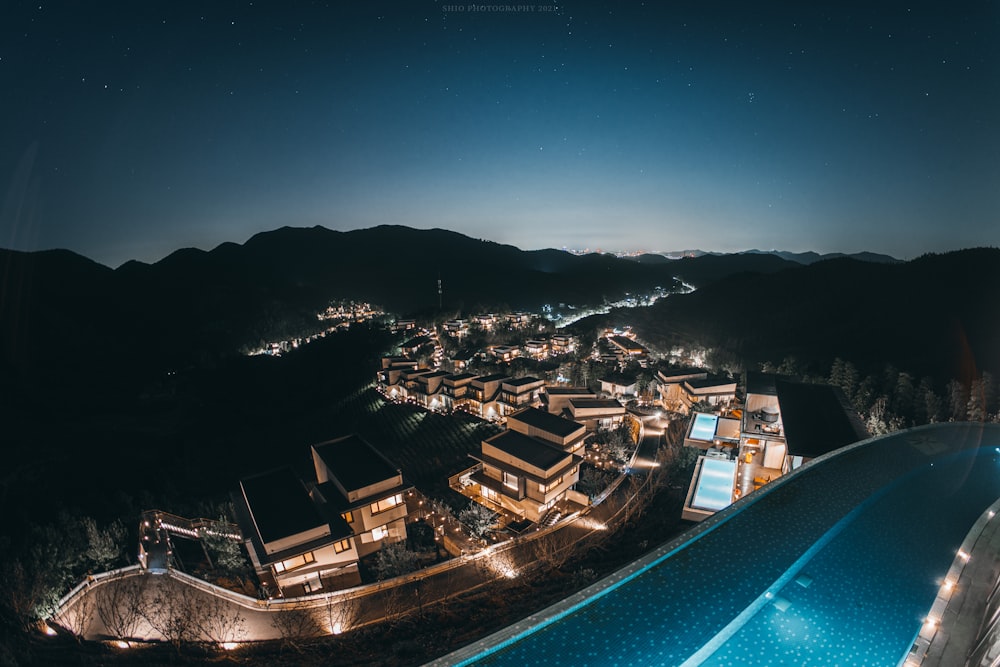 an aerial view of a resort at night