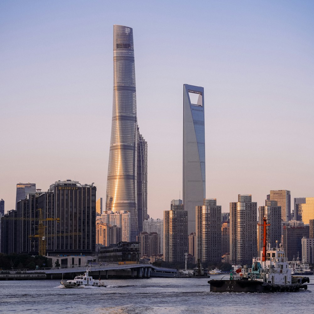 a large body of water next to a tall building