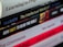 A close-up view of a staggered stack of books with varying titles and colors, some with bold or italicized text. The books appear to focus on religious or philosophical topics.