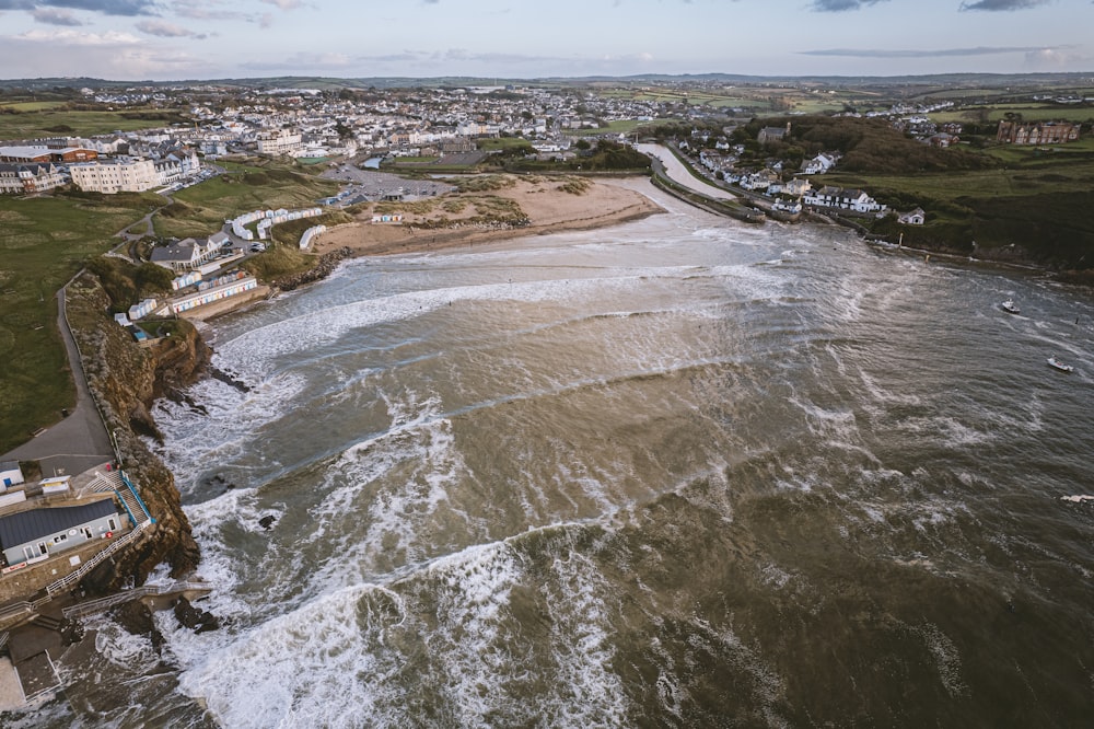 an aerial view of a beach and a town