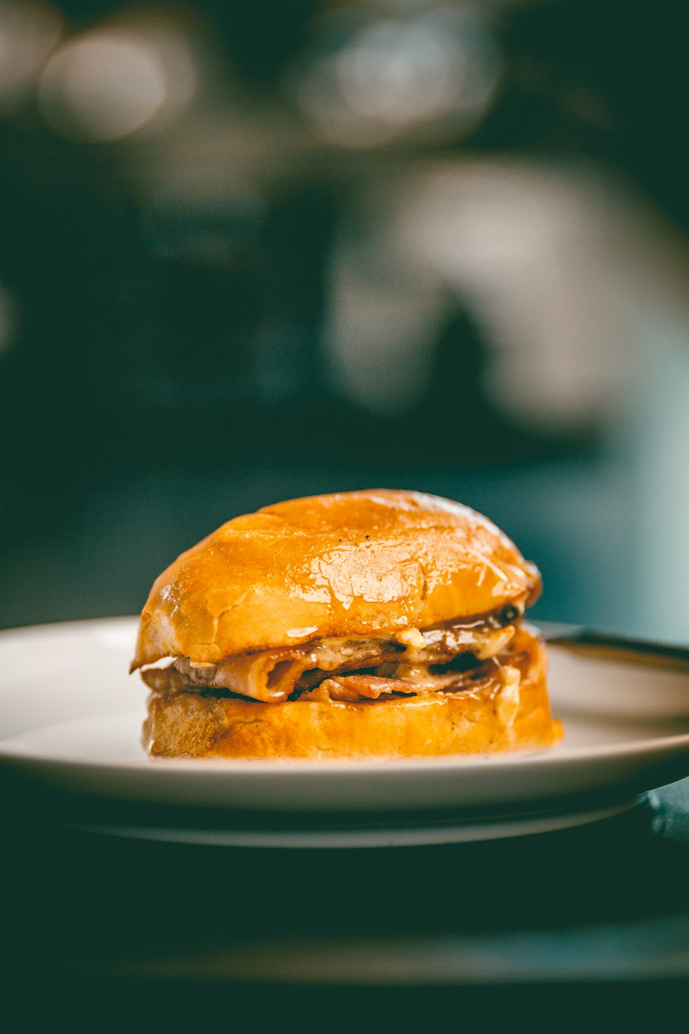 a sandwich sitting on top of a white plate