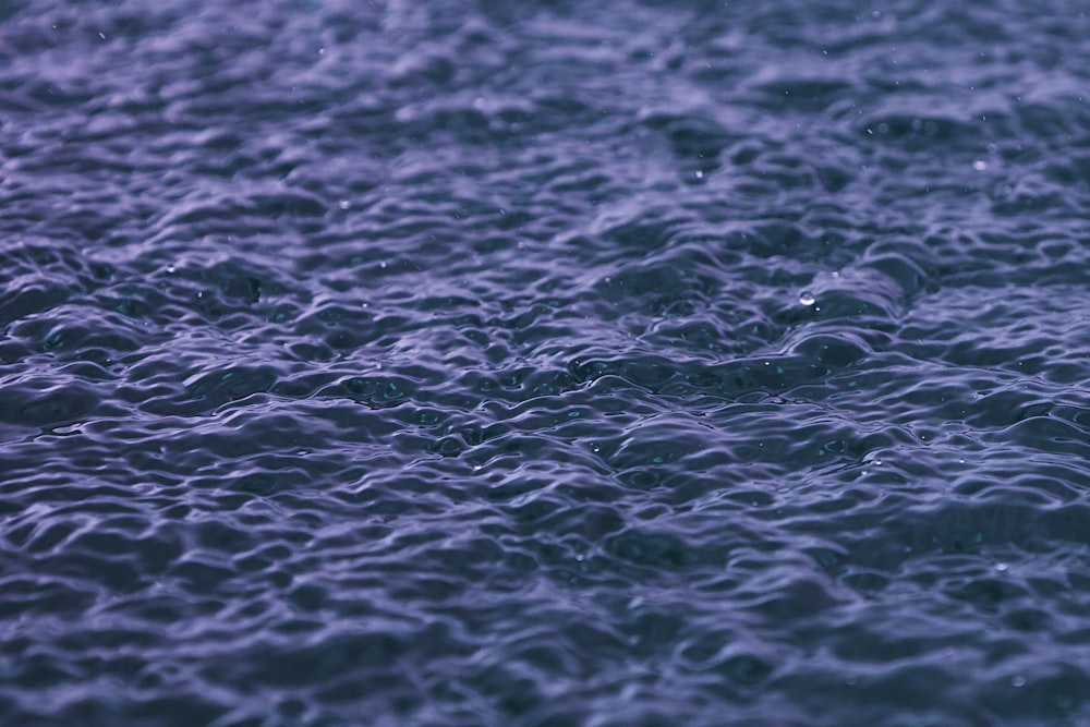 a close up view of a blue water surface