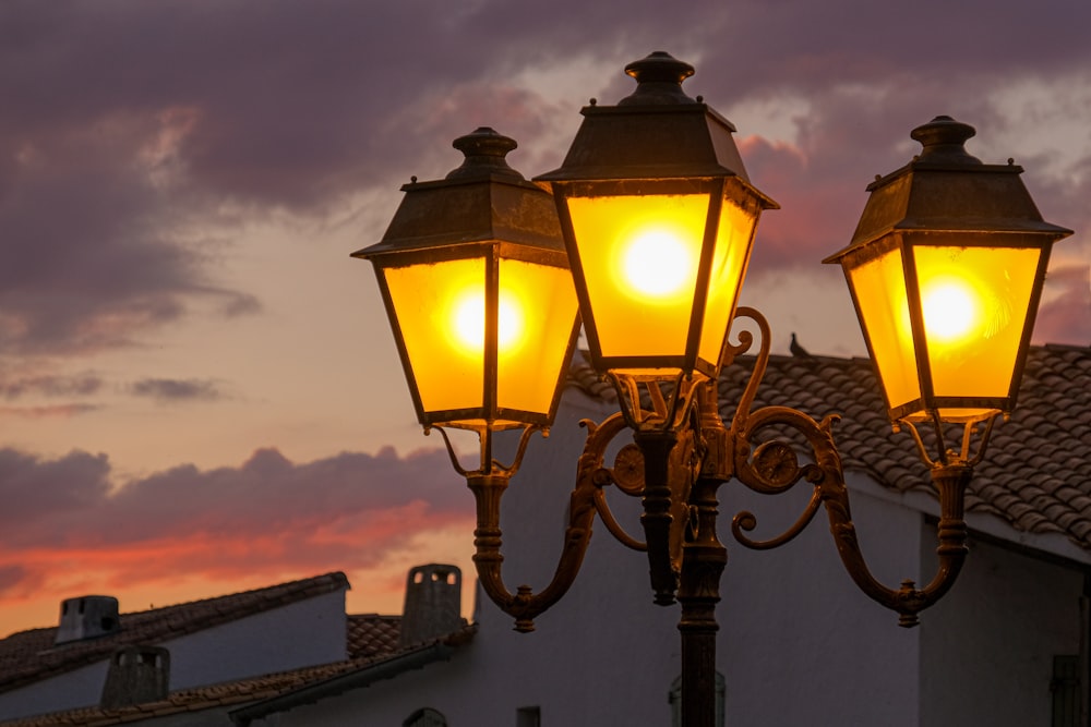 a couple of lights that are on a pole