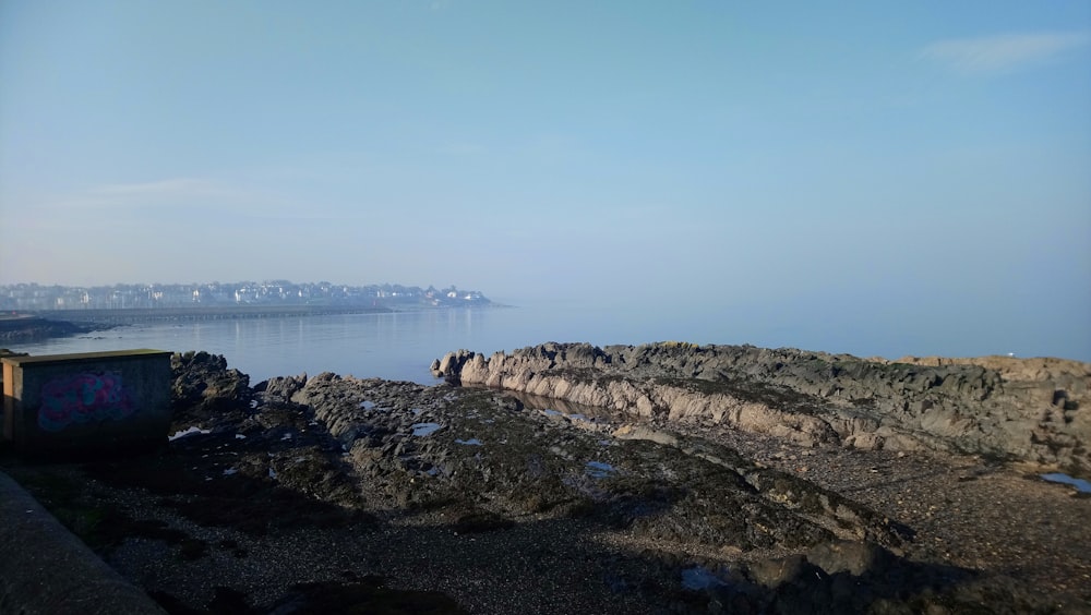 a view of a body of water from a cliff