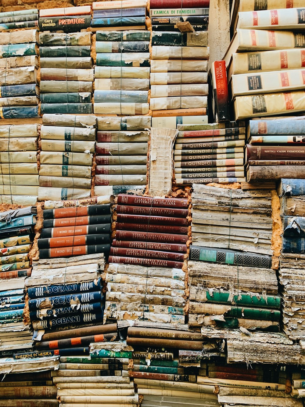 a pile of books stacked on top of each other