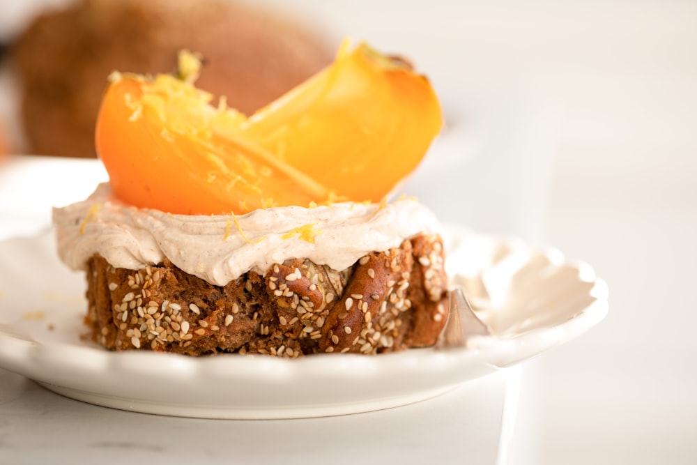 a piece of cake sitting on top of a white plate