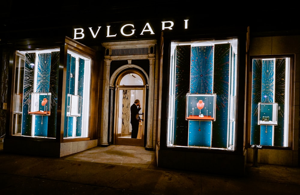 a person standing in a doorway of a building